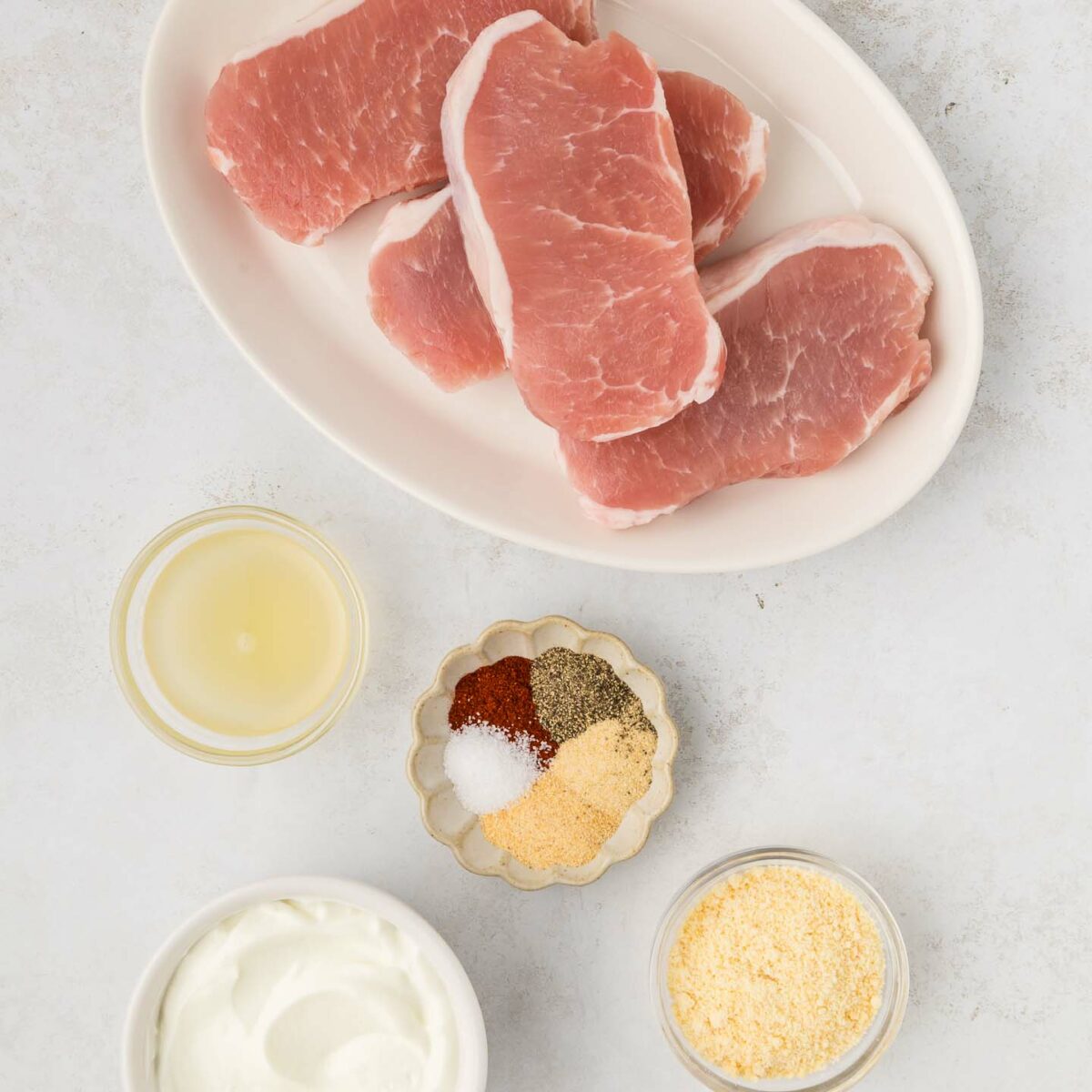 pork chop ingredients show in bowls