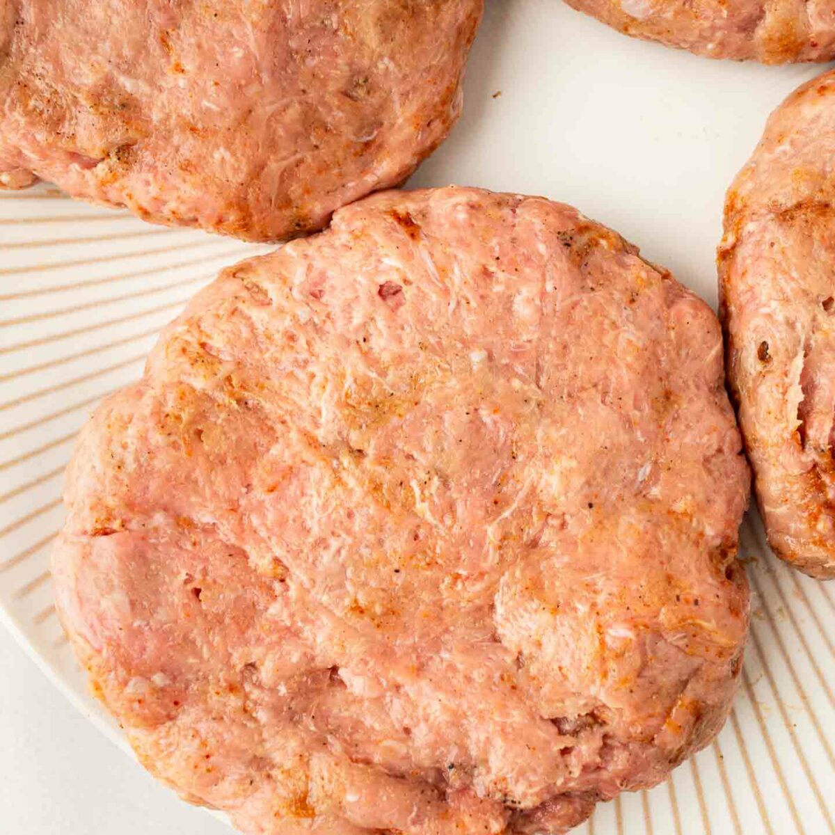 ground turkey shaped into burger patties