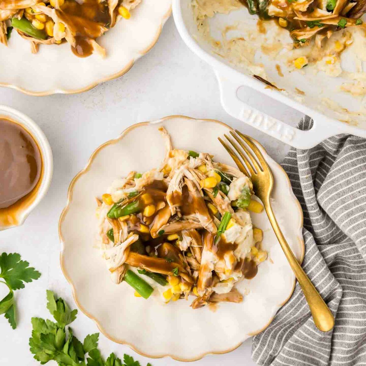 casserole on white plates with a fork