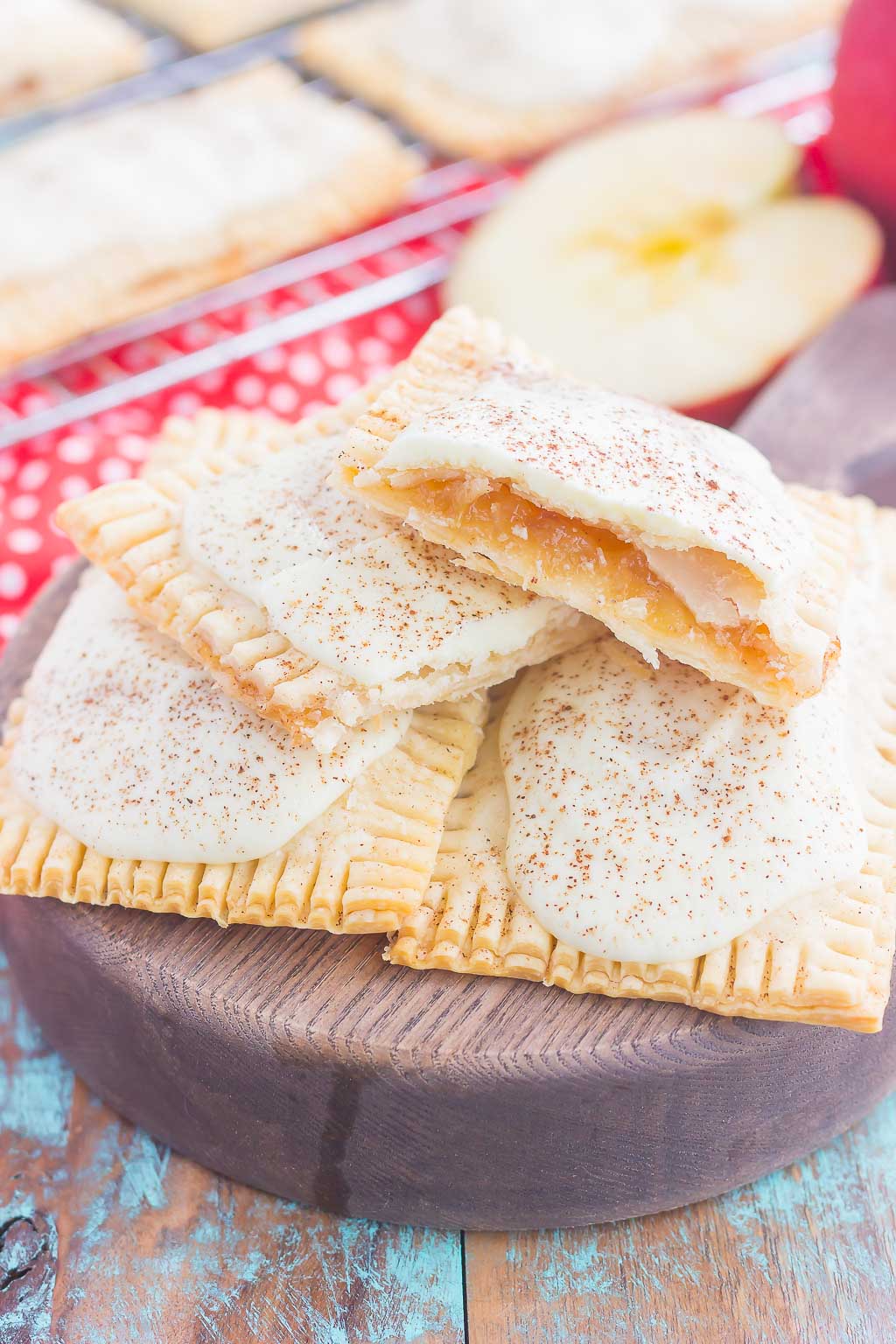 pop tarts stacked on top of each other with one cut in half to show the apple filling