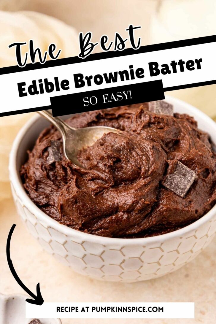 A white bowl filled with rich, chocolatey edible brownie batter, topped with chocolate chunks and a spoon inside. Text overlays read “The Best Edible Brownie Batter SO EASY!” and point to “Recipe at pumpkinnspice.com.”.