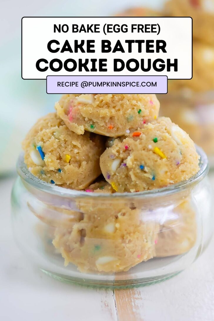 A small glass jar filled with scoops of cookie dough mixed with colorful sprinkles. Text overlay reads: No Bake (Egg Free) Cake Batter Cookie Dough. Recipe @pumpkinnspice.com.